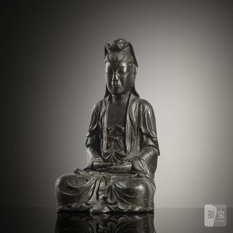 A bronze figure of Guanyin